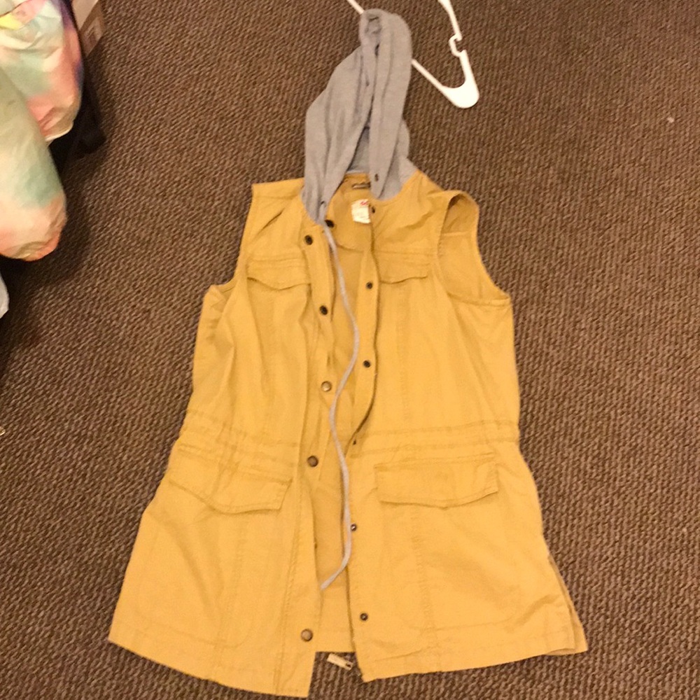Hooded brown and gray jean jacket .